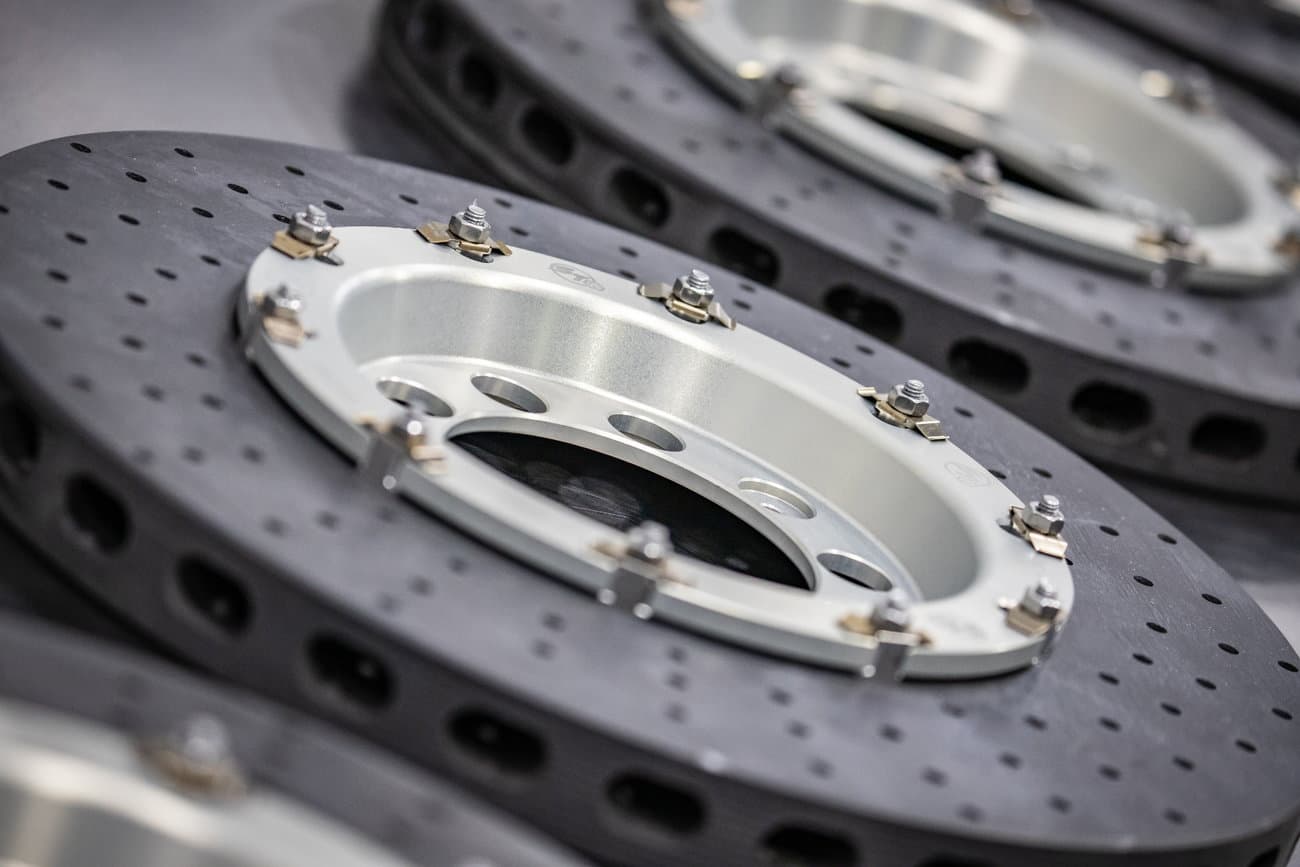 Carrera GT on lift with Surface Transforms carbon ceramic rotors installed