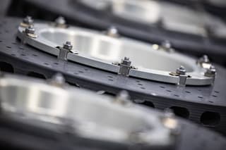 Surface Transforms rotor and caliper assembly on Carrera GT corner