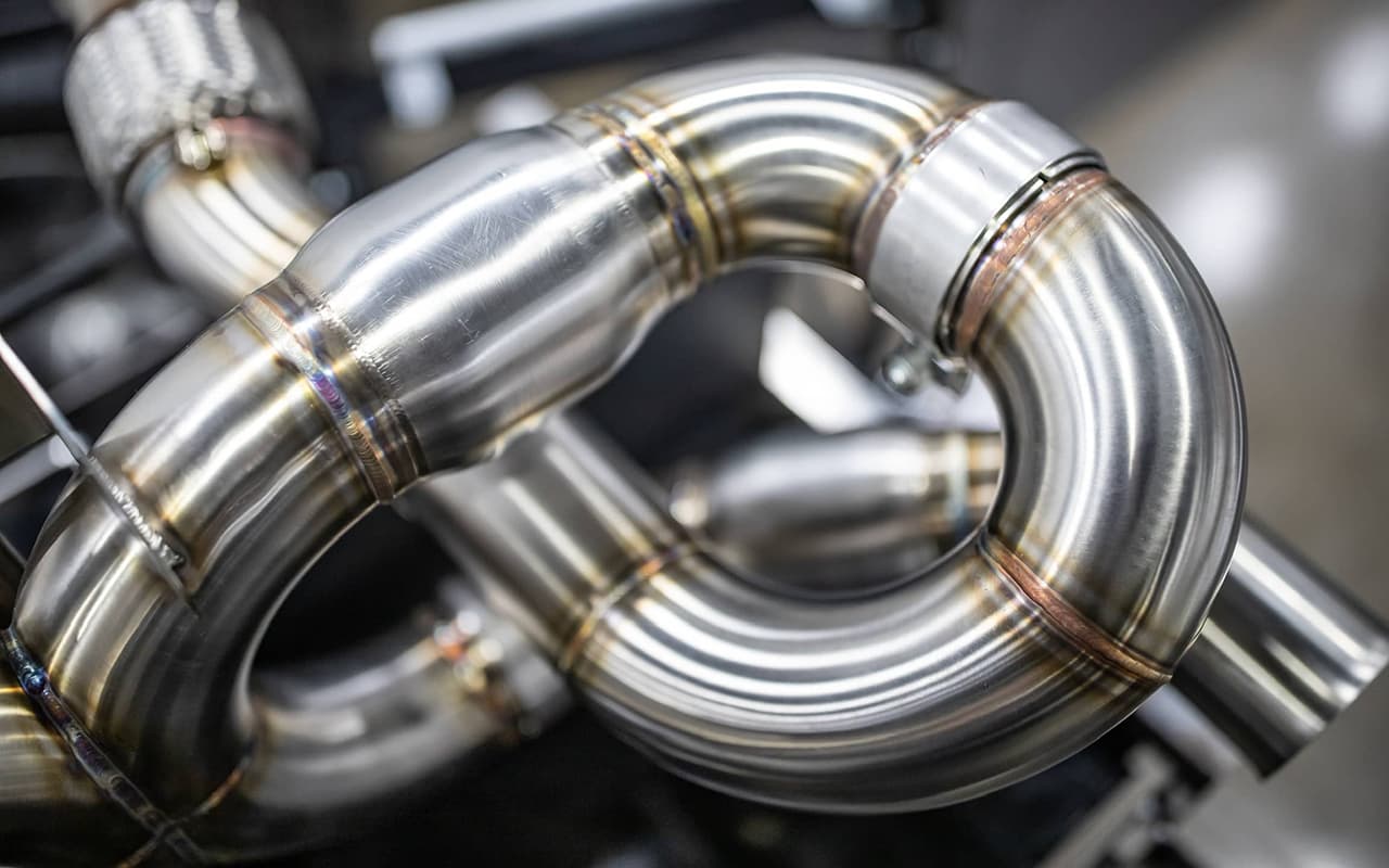 Exhaust system installed showing fitment and routing