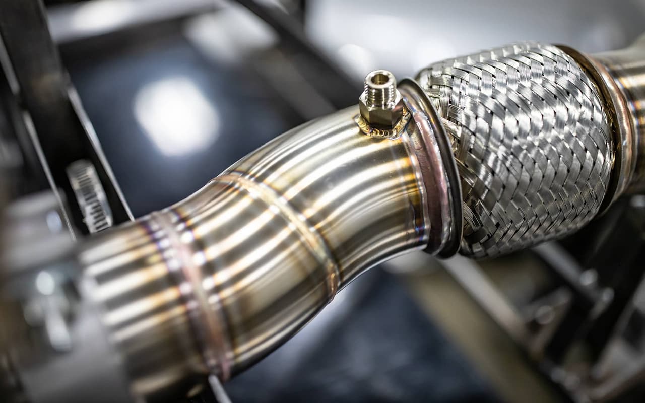 Stainless steel exhaust piping and flex section components