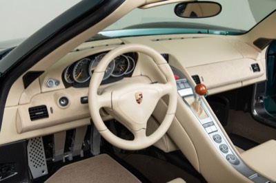 Bespoke cream leather interior of Canepa Carrera GT SC #01 with beechwood shifter